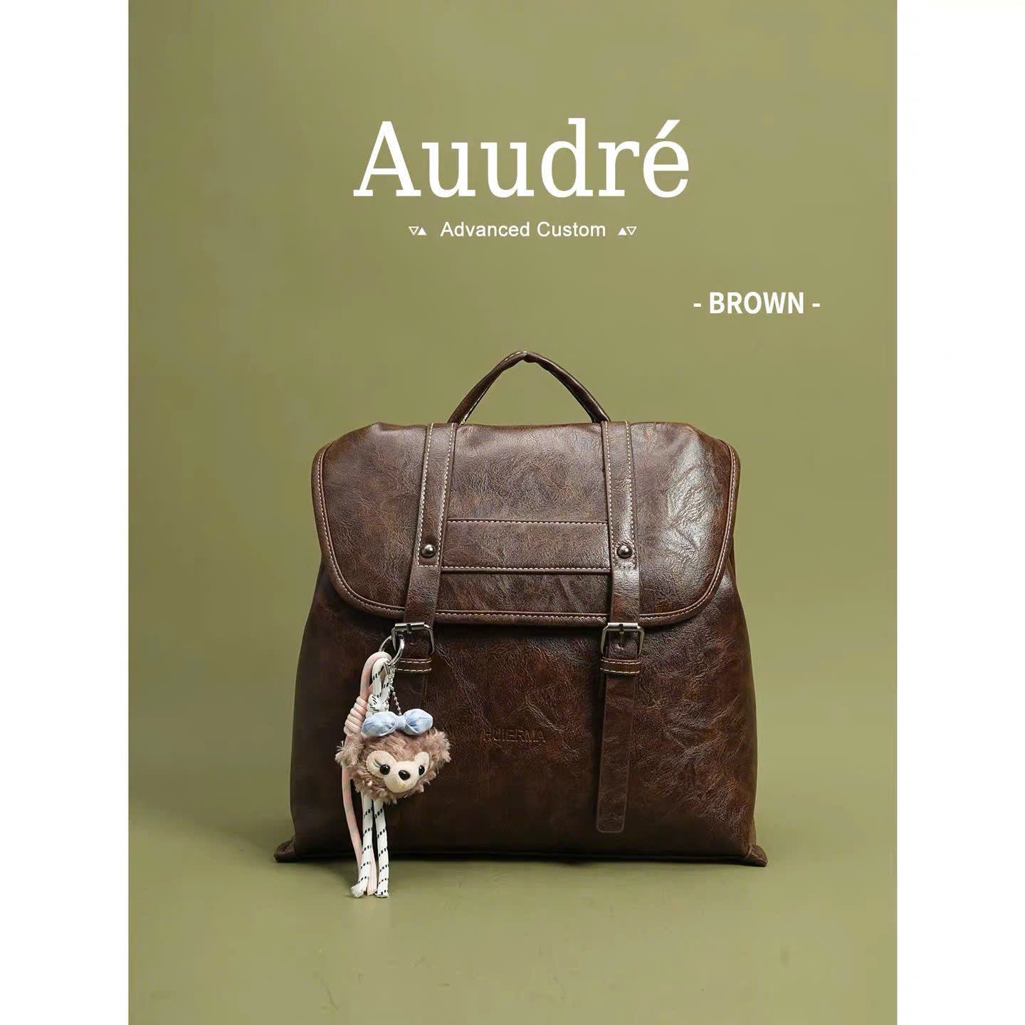 Balo da Auudré nắp gập charm gấu bông