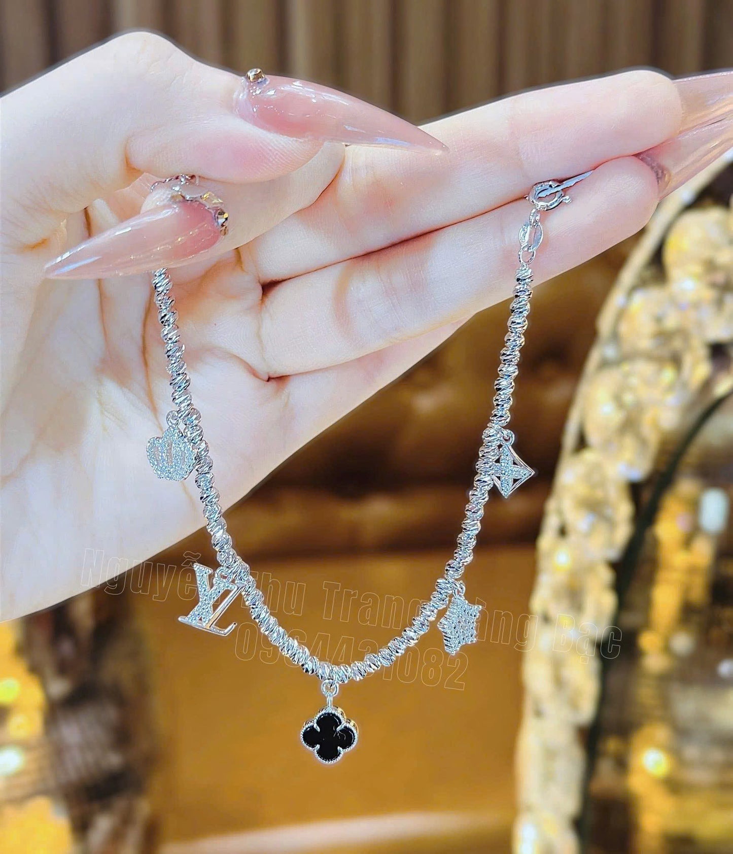 Lắc tay - lắc chân bạc VCA