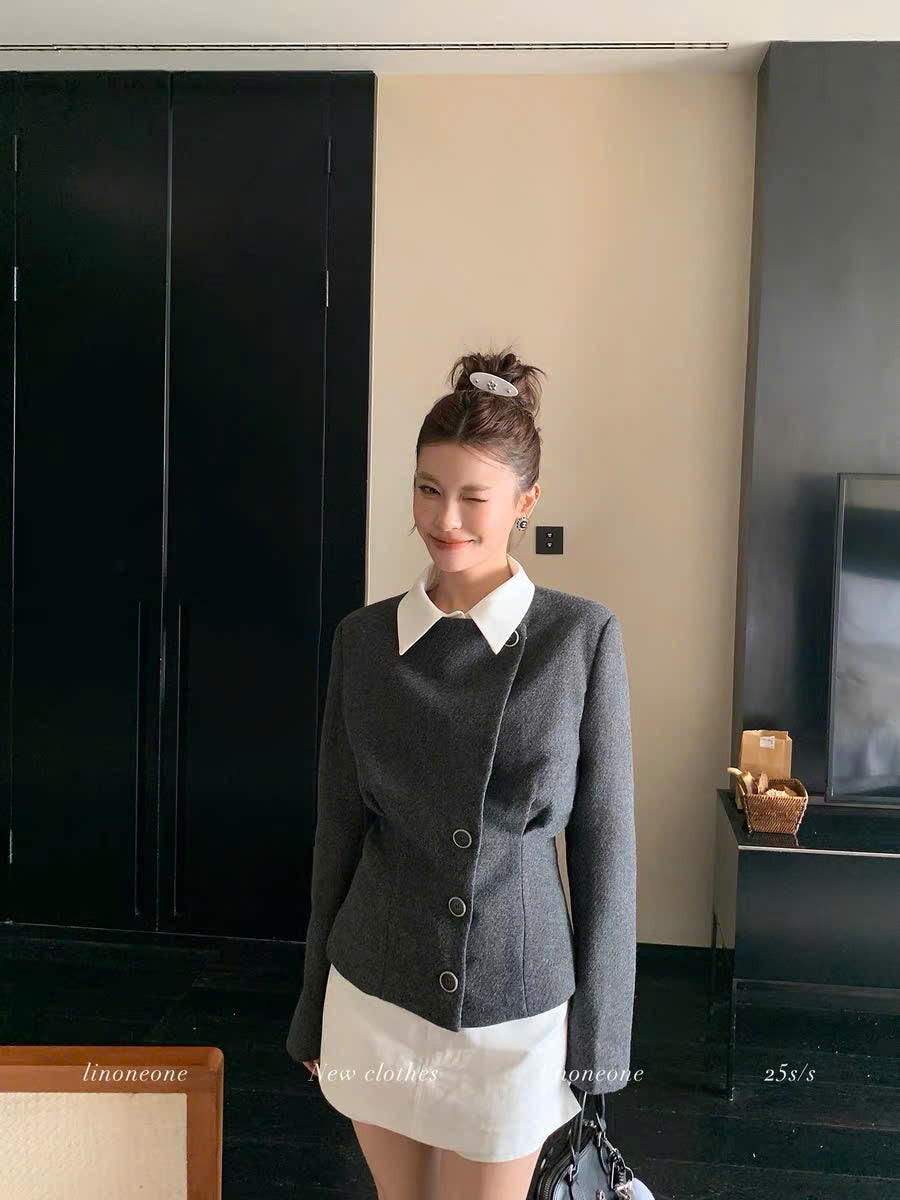 Áo khoác dáng vest vạt lệch thanh lịch
