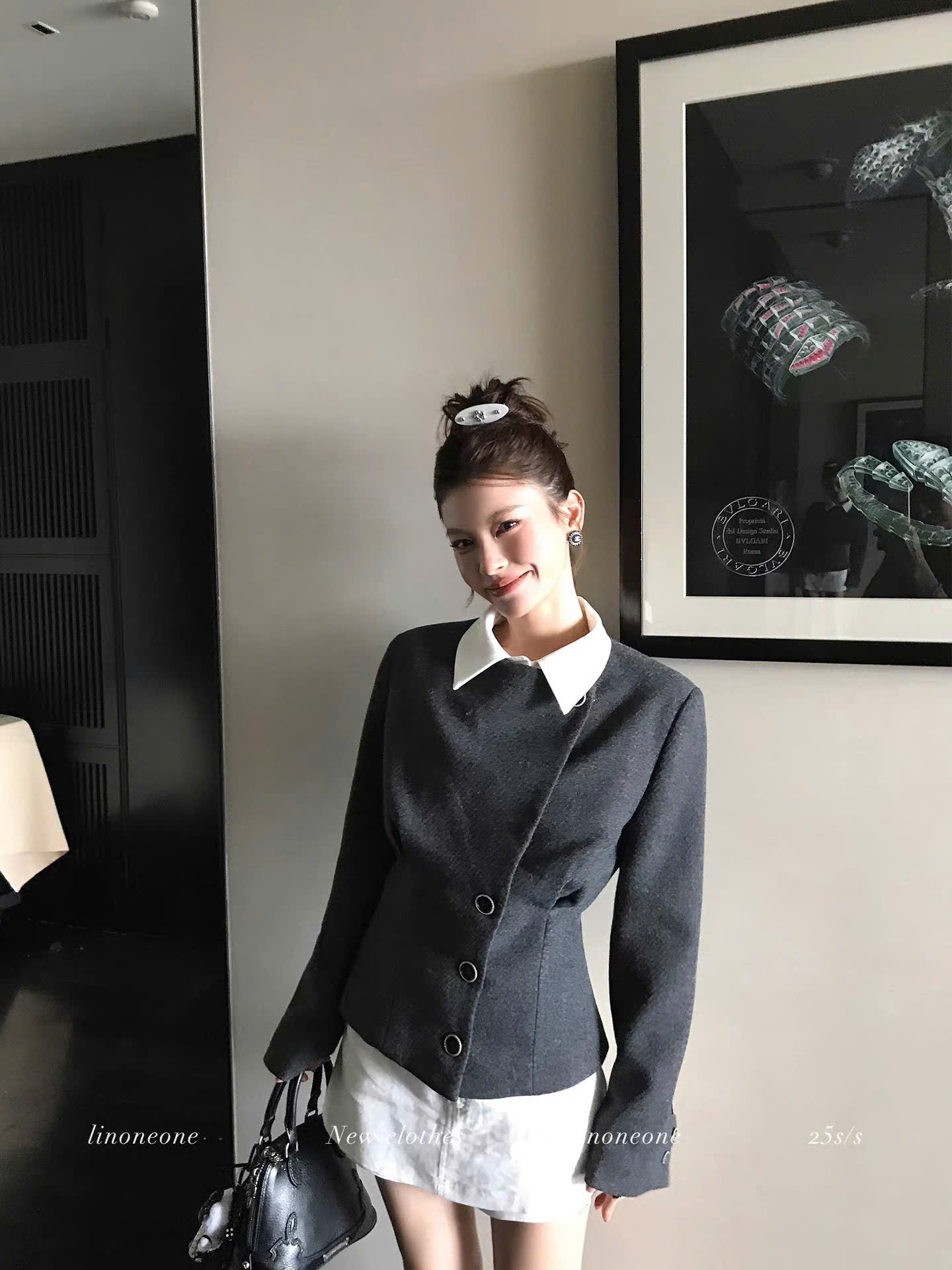 Áo khoác dáng vest vạt lệch thanh lịch