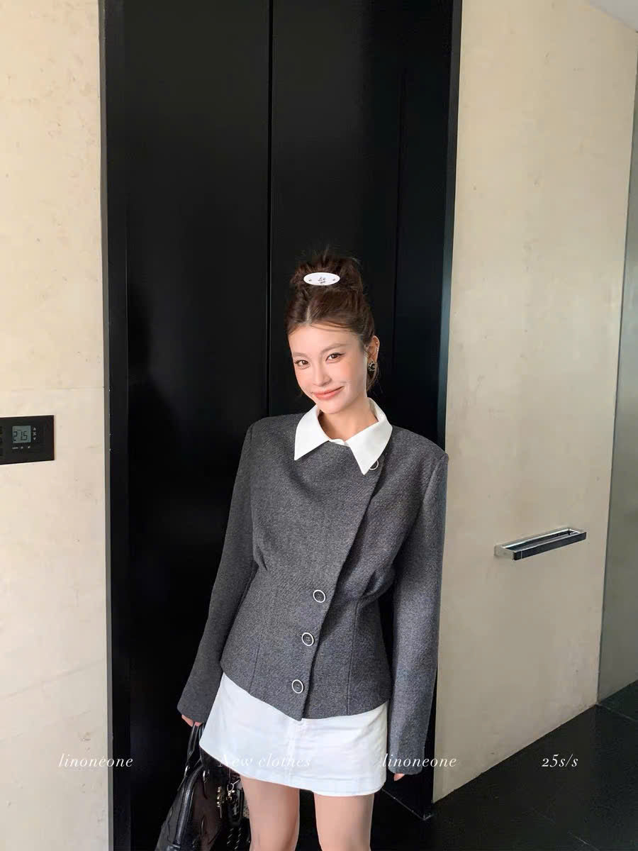 Áo khoác dáng vest vạt lệch thanh lịch