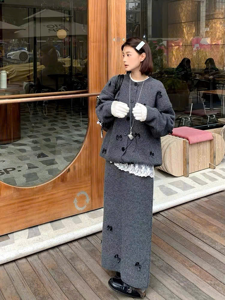 Set áo cardigan và chân váy dài đính nơ