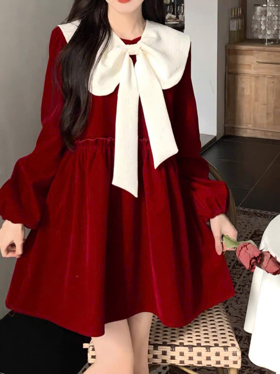 Váy đỏ tay dài cổ nơ trắng