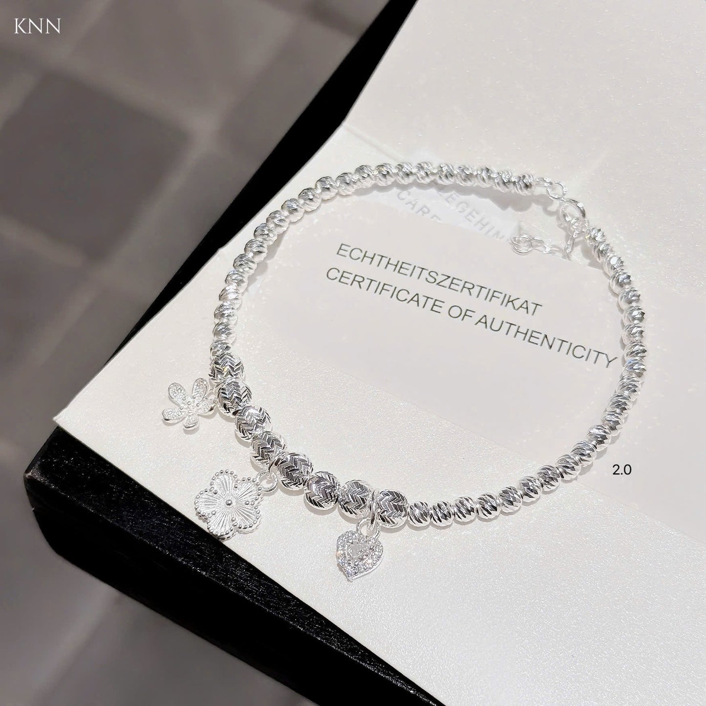 Lắc bạc nữ bi tròn phối charm xinh