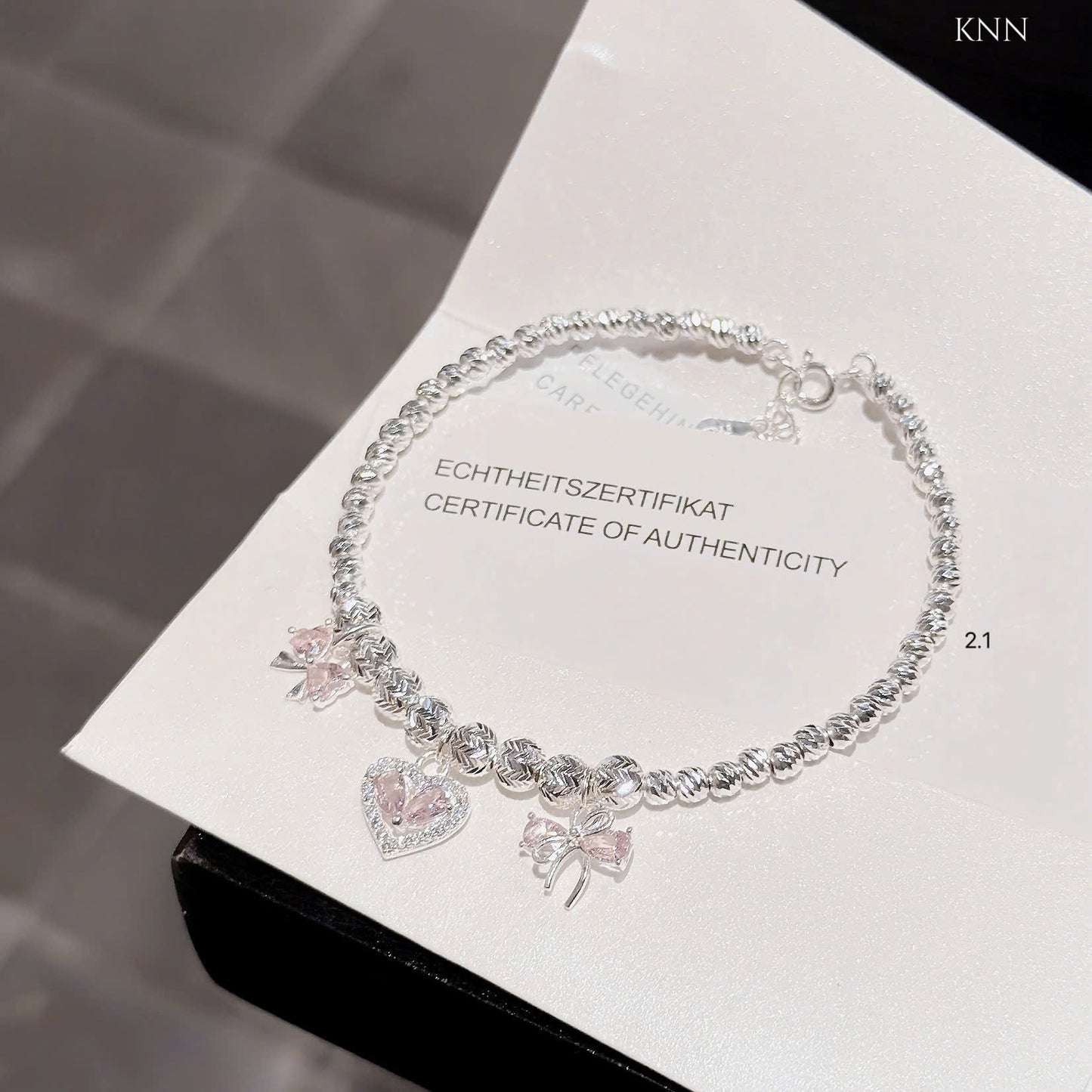 Lắc bạc nữ bi tròn phối charm xinh