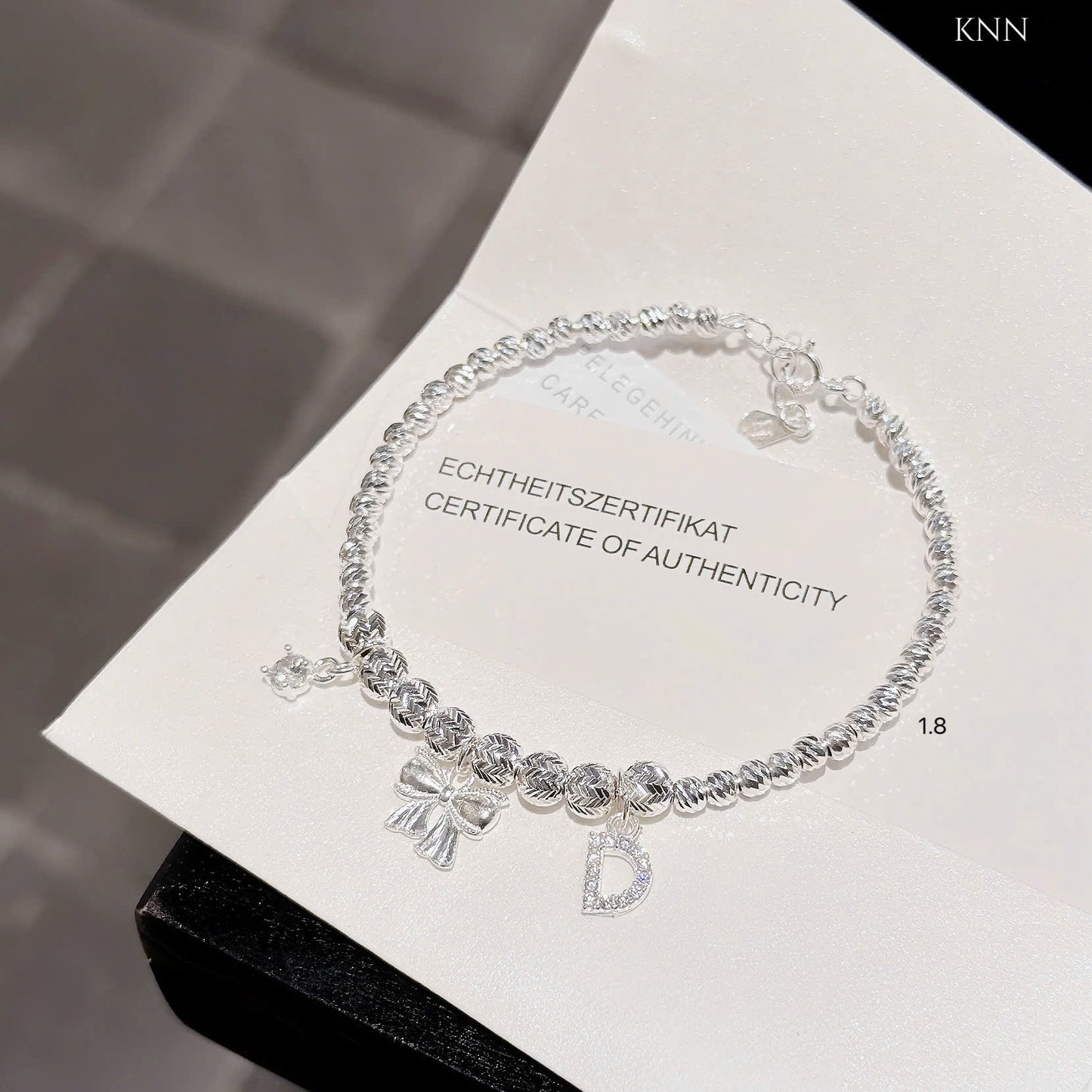 Lắc bạc nữ bi tròn phối charm xinh