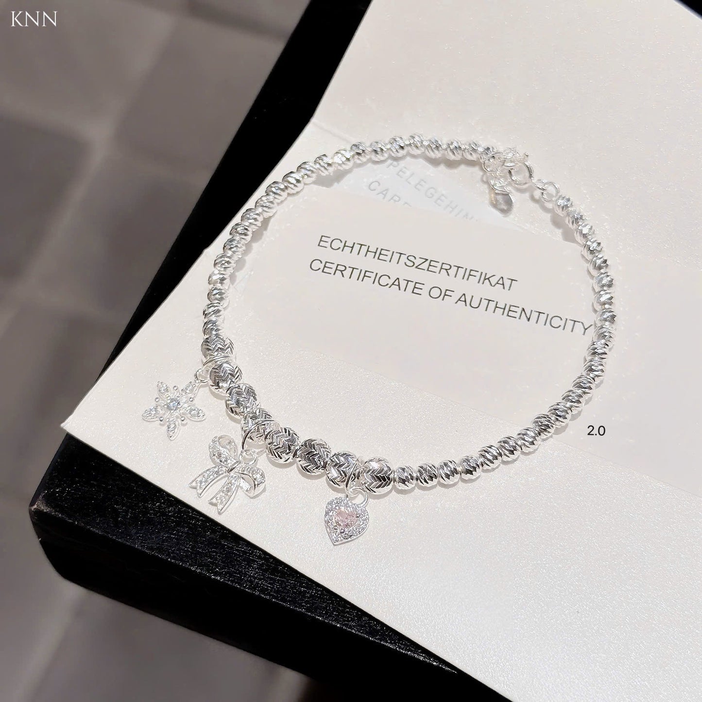 Lắc bạc nữ bi tròn phối charm xinh