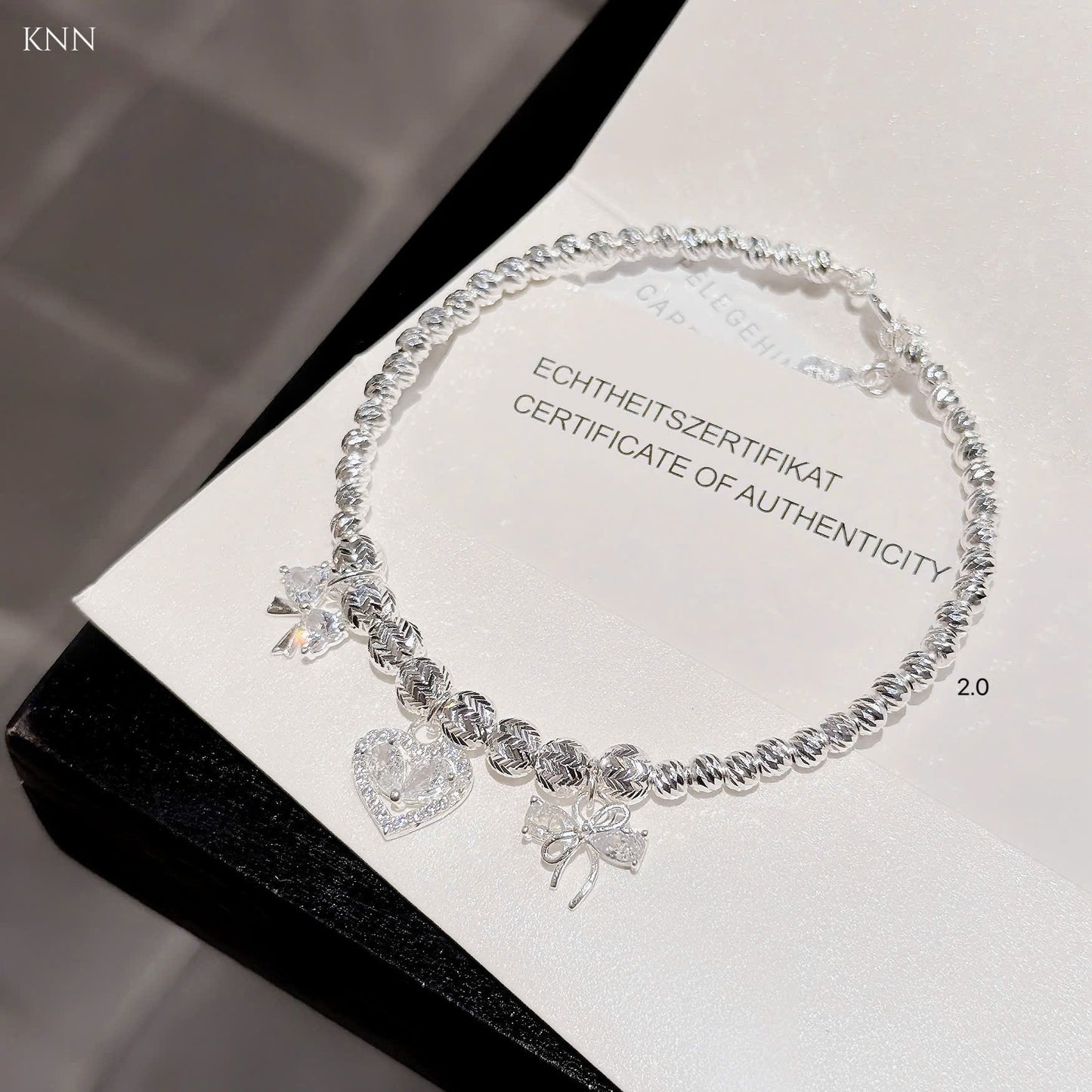 Lắc bạc nữ bi tròn phối charm xinh