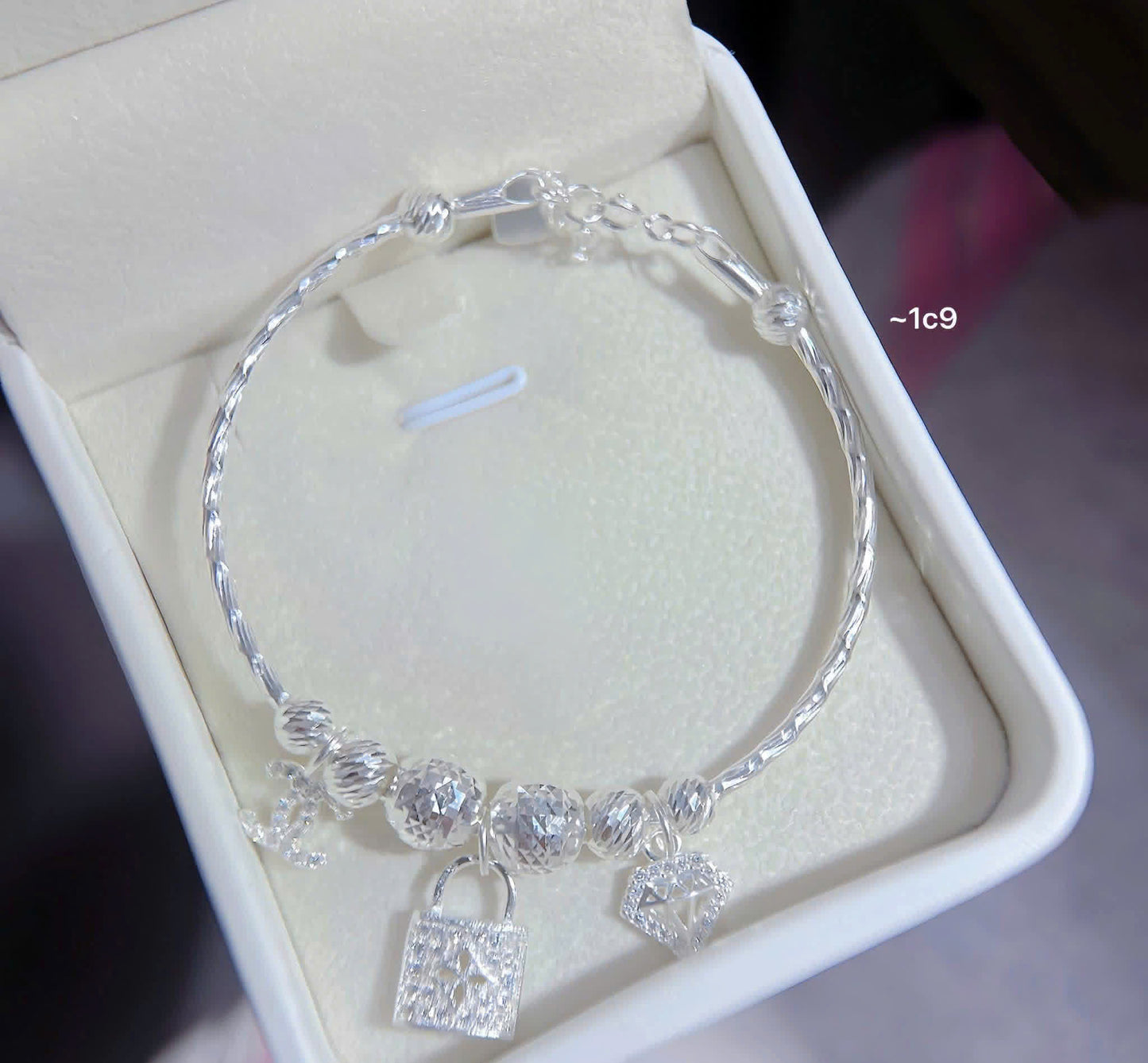 Lắc bạc nữ tròn bi charm sáng xinh