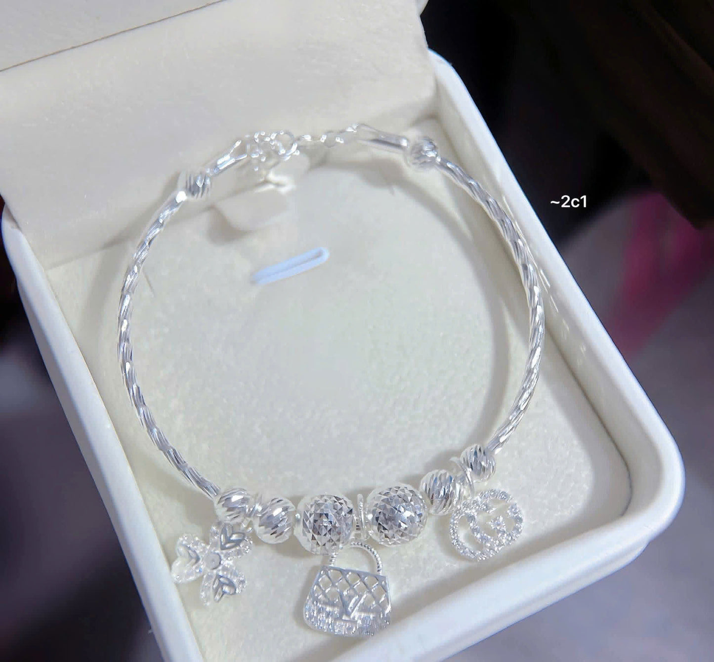 Lắc bạc nữ tròn bi charm sáng xinh