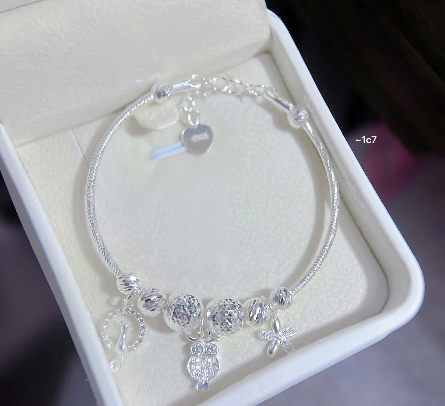 Lắc bạc nữ tròn bi charm sáng xinh