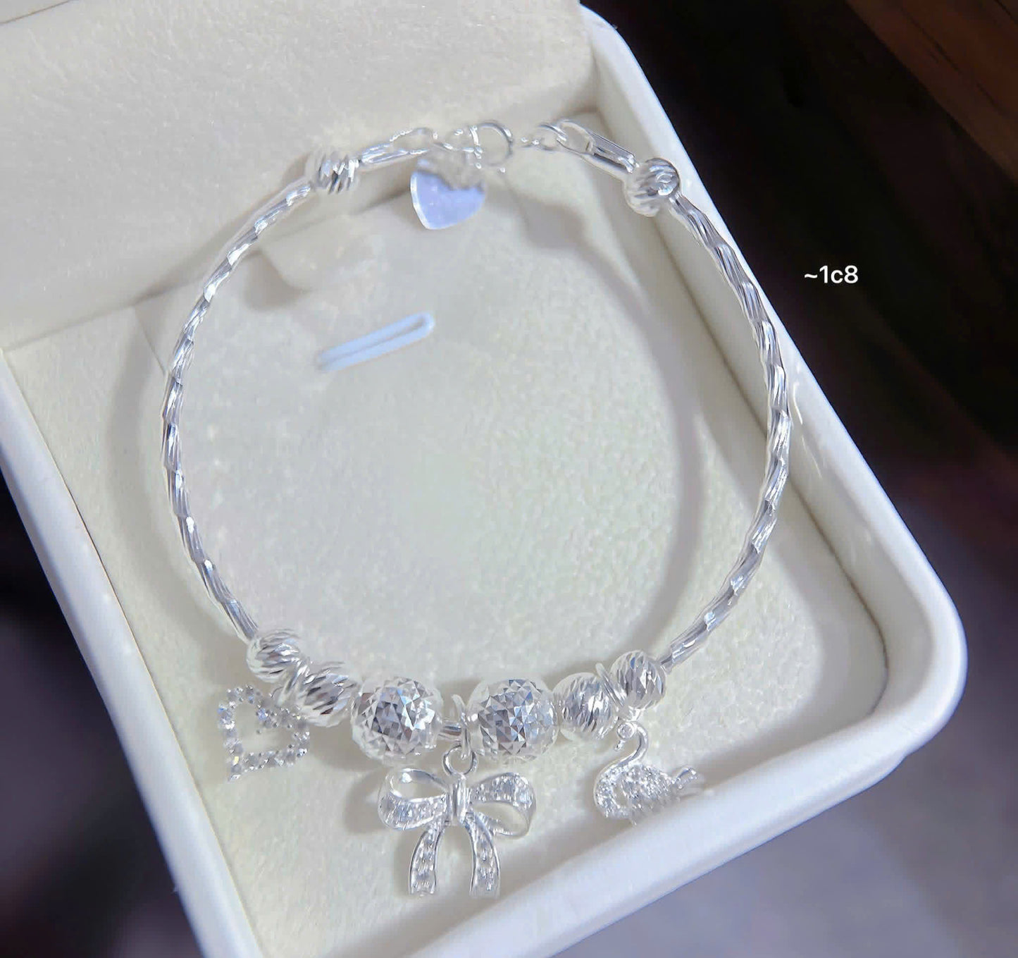 Lắc bạc nữ tròn bi charm sáng xinh