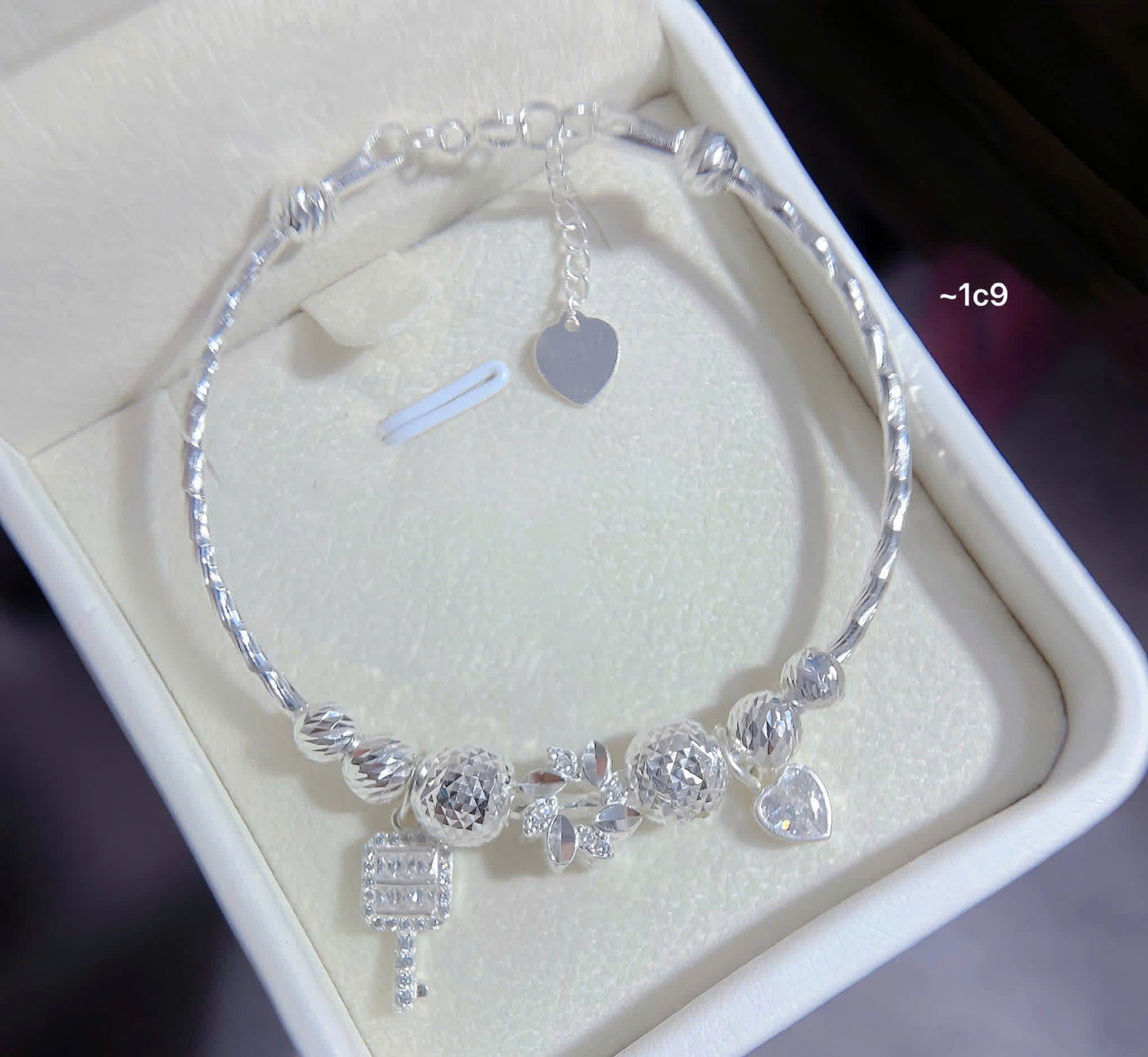 Lắc bạc nữ tròn bi charm sáng xinh
