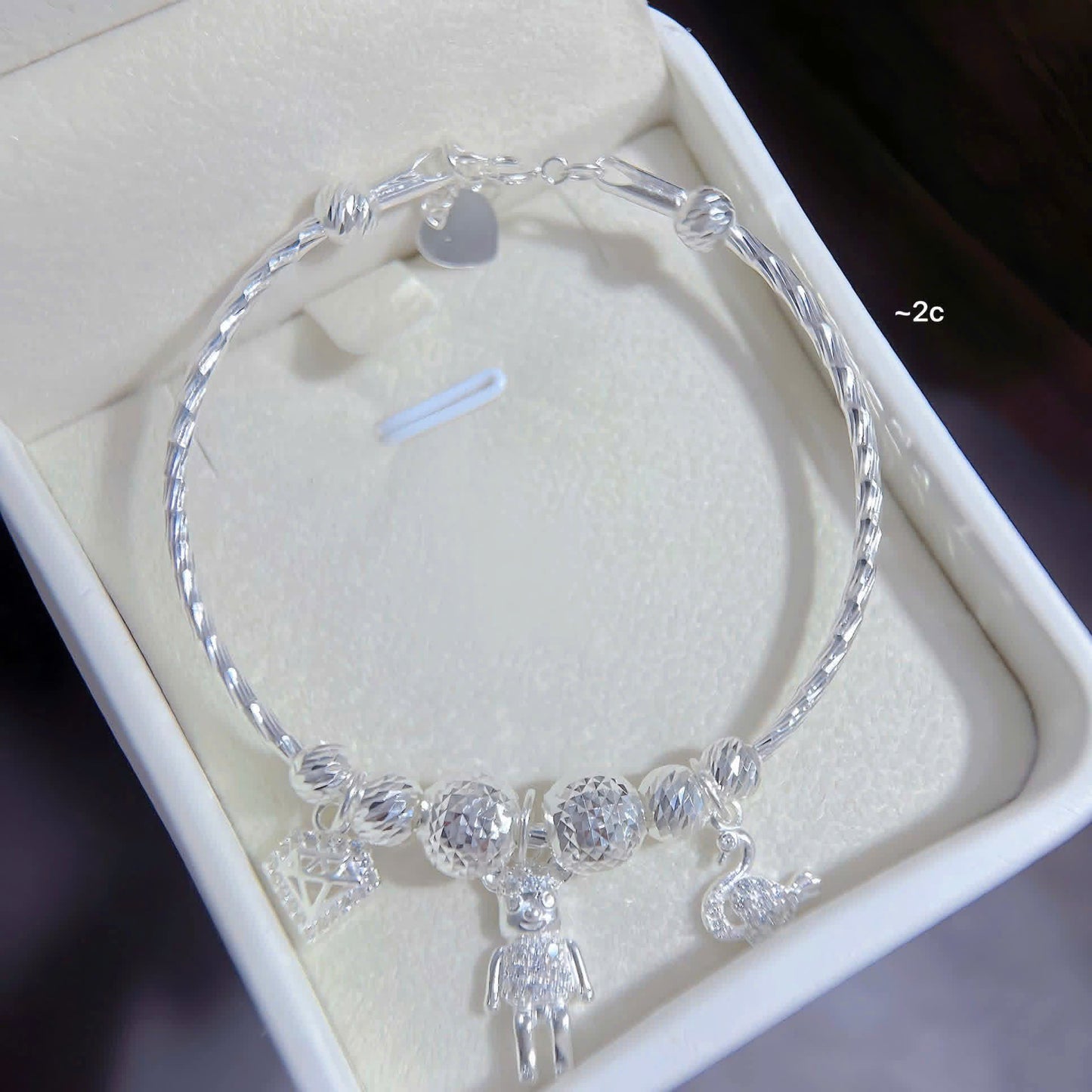 Lắc bạc nữ tròn bi charm sáng xinh