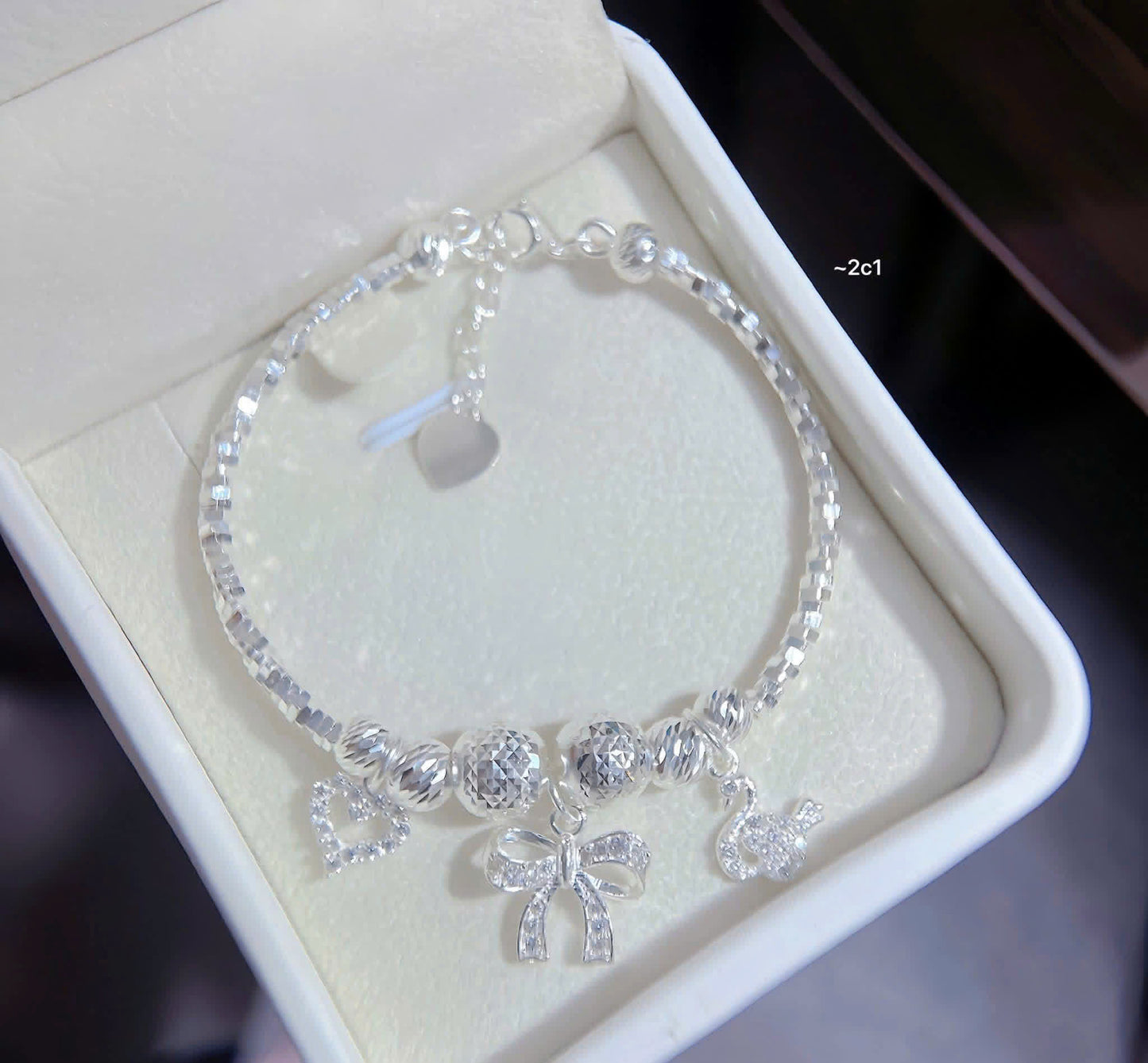 Lắc bạc nữ tròn bi charm sáng xinh