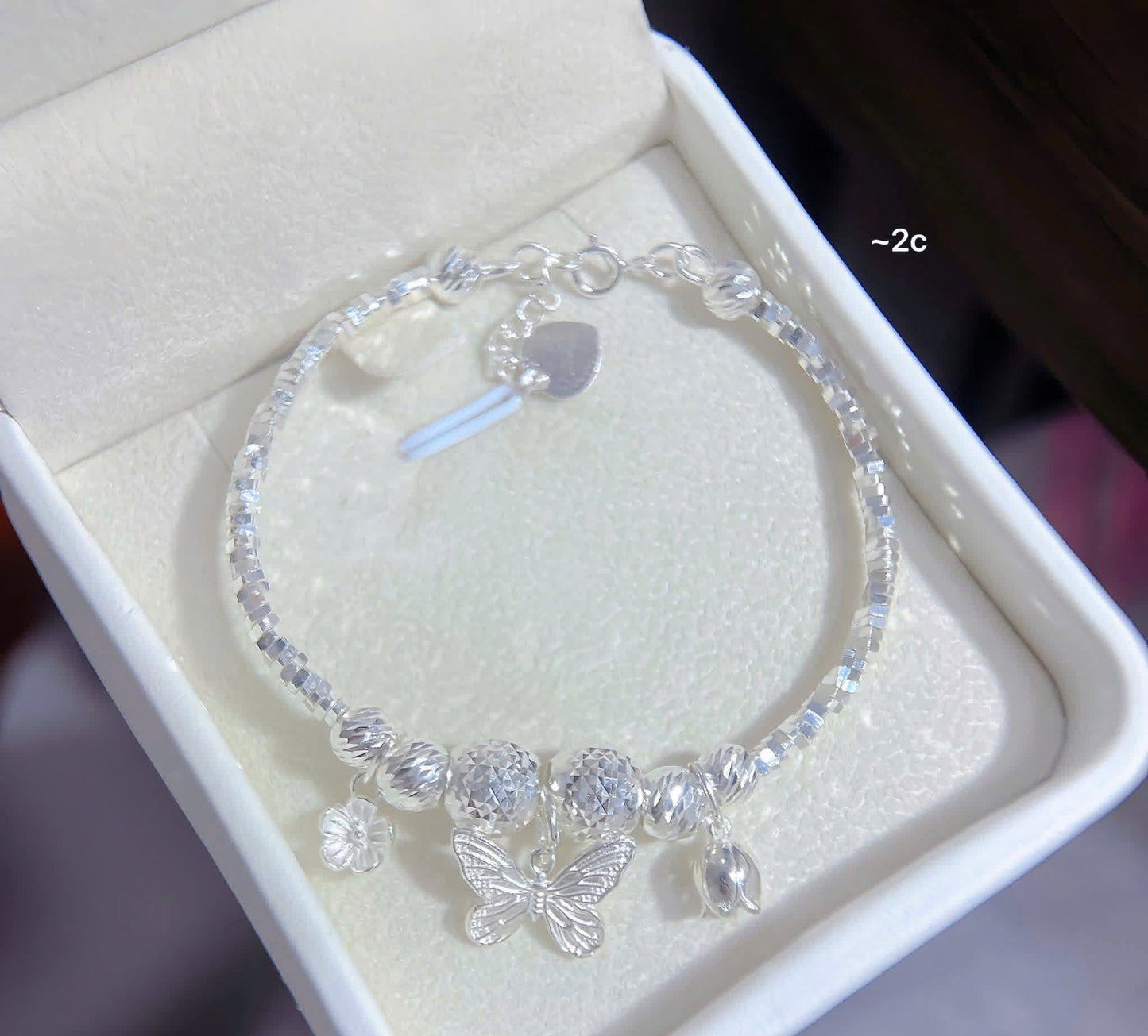 Lắc bạc nữ tròn bi charm sáng xinh