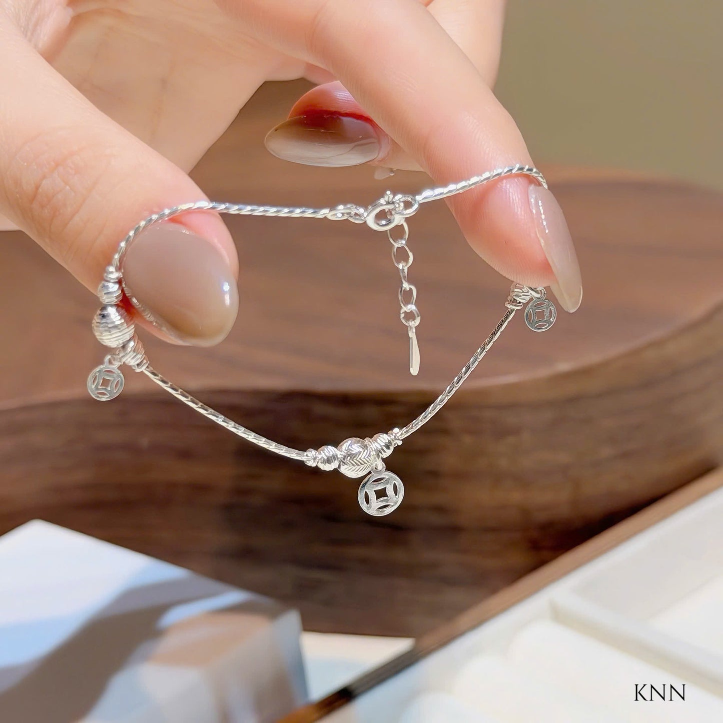 Lắc tay bạc kim tiền
