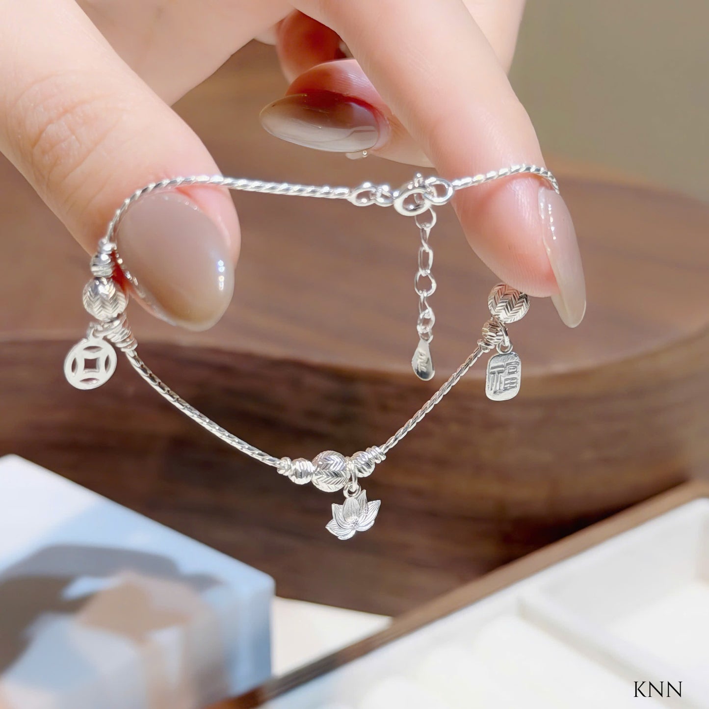 Lắc tay bạc kim tiền