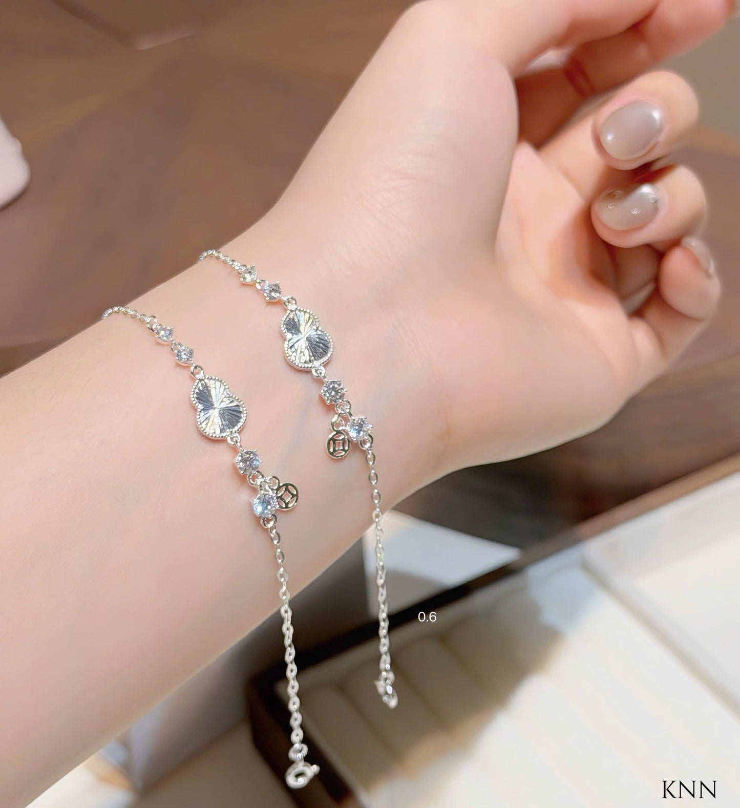 Lắc tay bạc kim tiền