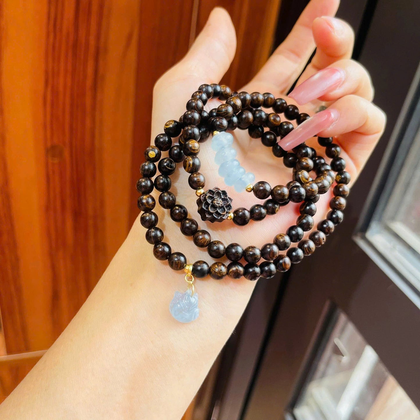 Chuỗi trầm sánh mix ngũ điếu phối charm hồ lỳ móc bạc xi vàng
