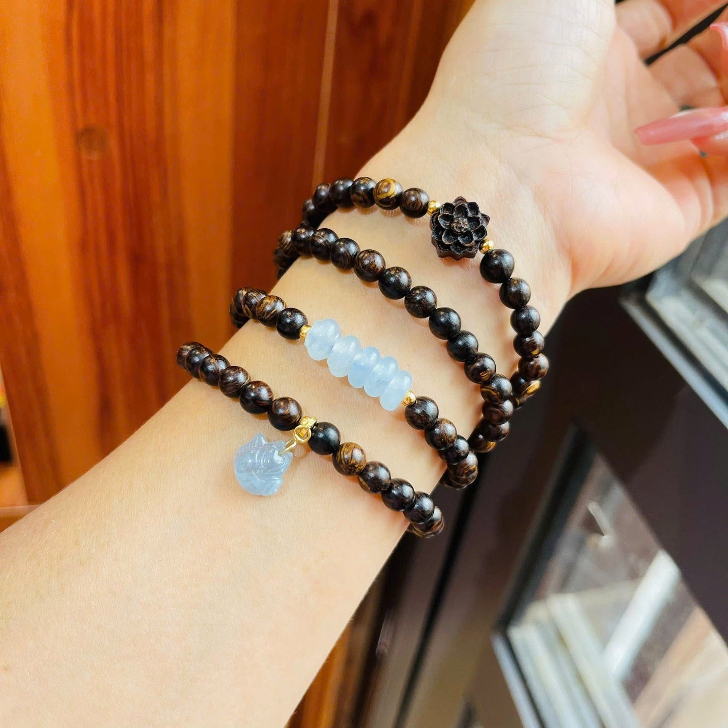 Chuỗi trầm sánh mix ngũ điếu phối charm hồ lỳ móc bạc xi vàng
